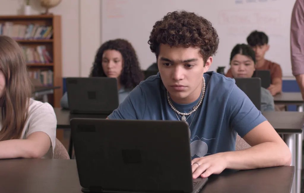 A student takes a Benchmark assessment on a laptop.